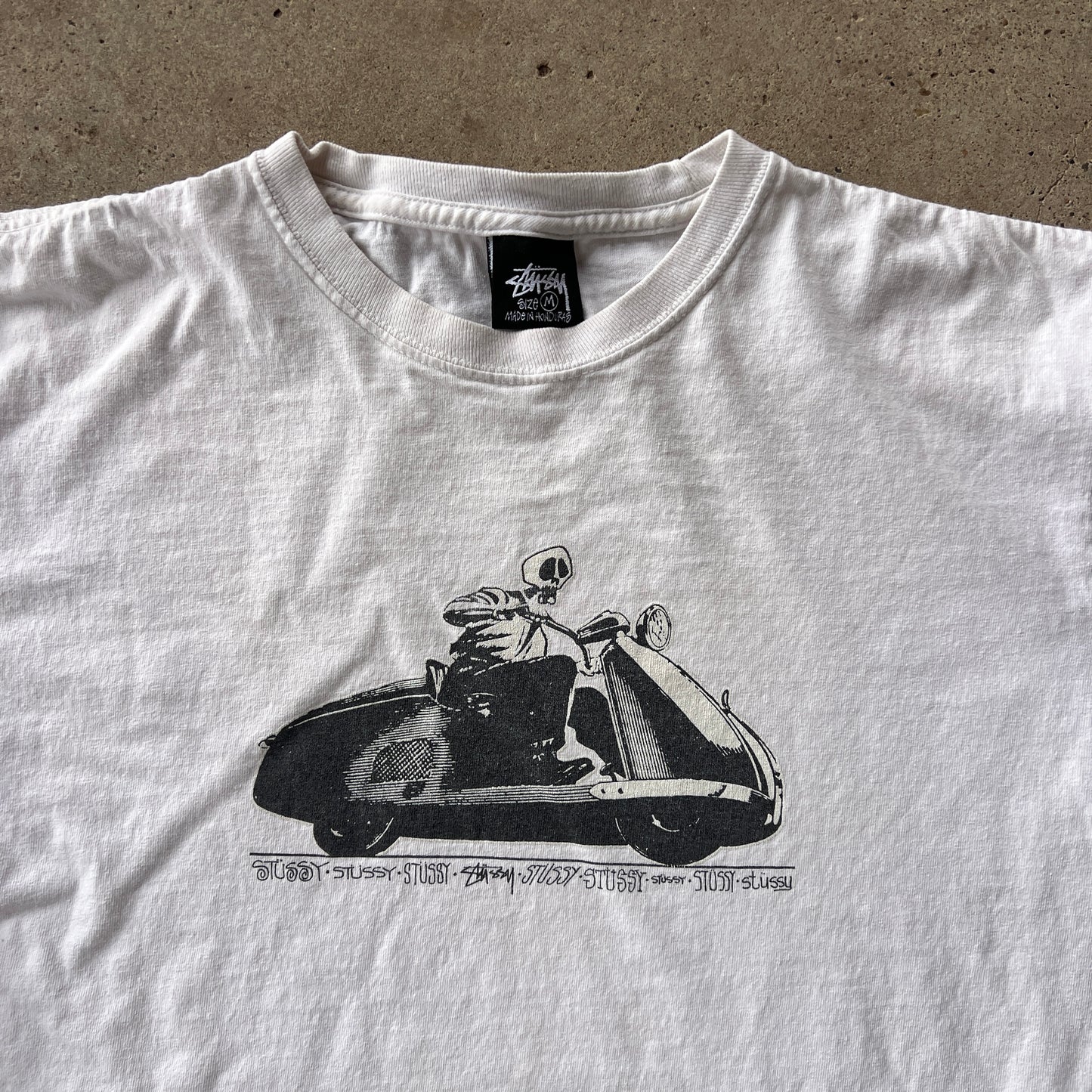(M) Stussy skull scooter tee