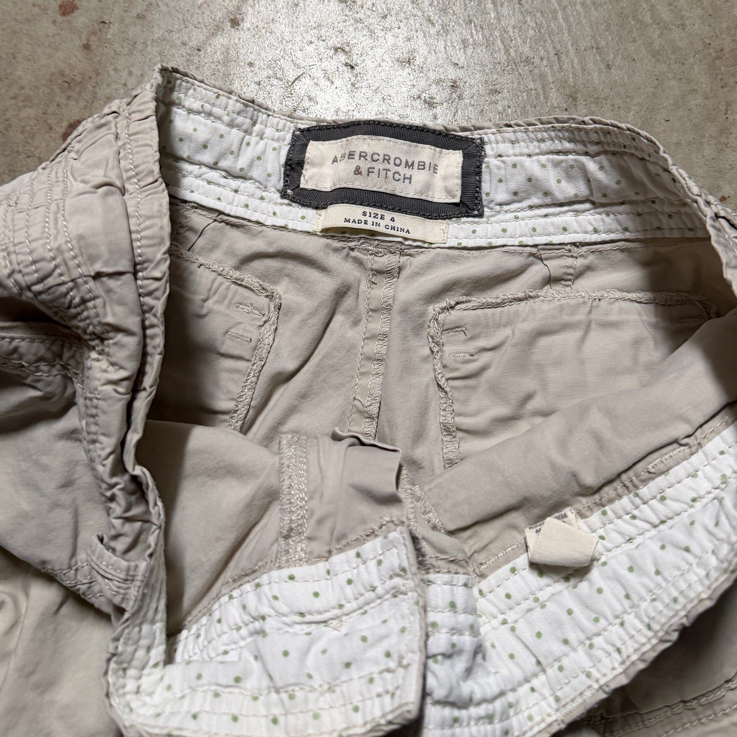 (4) ladies Abercrombie & fitch cargo adjustable capri pants
