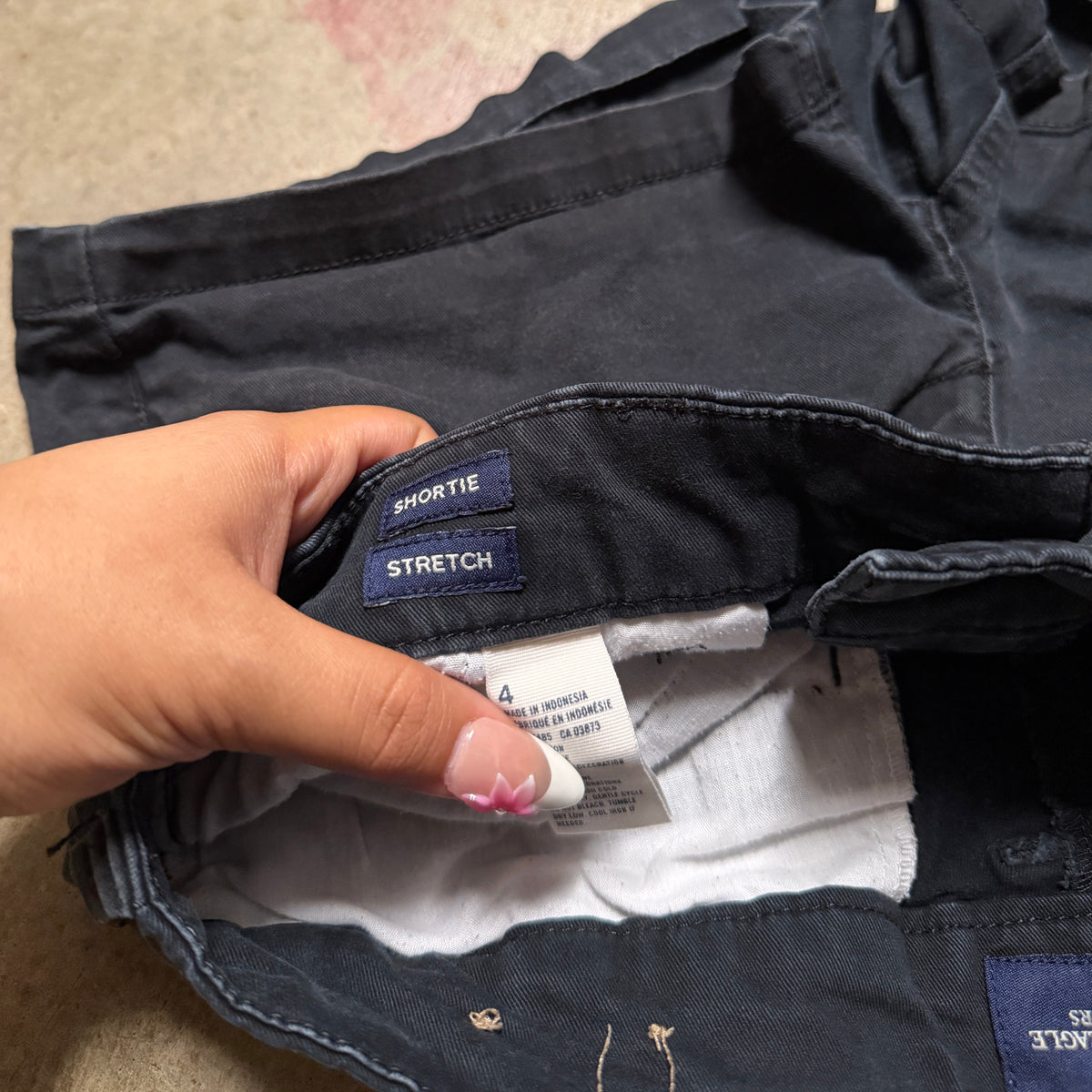 (4) ladies American eagle mini shorts